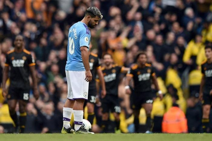 Shocked Sergio: Sergio Aguero looks on as Wolves celebrate their second goal in a 2-0 win over Manchester City
