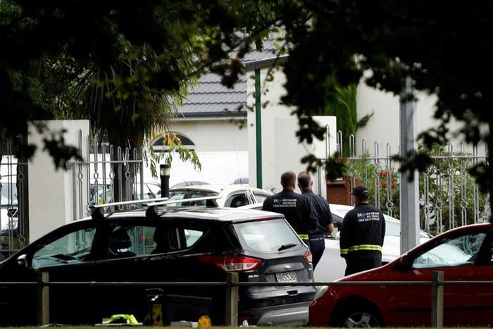 Security officials walk outside the Masjid al Noor mosque in Christchurch after a deadly shooting attack there on March 15, 2019.