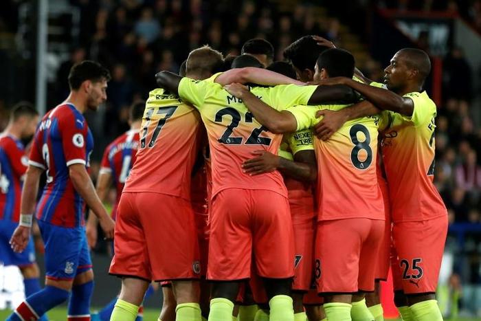 Manchester City celebrate their second goal against Crystal Palace at Selhurst Park