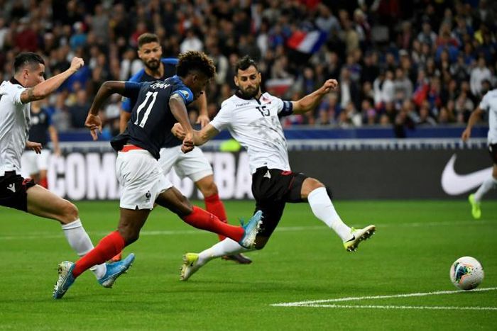 Kingsley Coman set France on the way to a comfortable victory over Albania with his ninth-minute goal