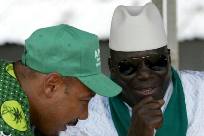Gambia's former president Yahya Jammeh (R) and ex-army captain Edward Singhateh, both seen here in 2006, were close allies