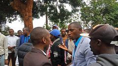 Two Kenyan MPs from the same party exchange serious blows in church over microphone (Video)