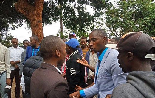 Two Kenyan MPs from the same party exchange serious blows in church over microphone (Video)