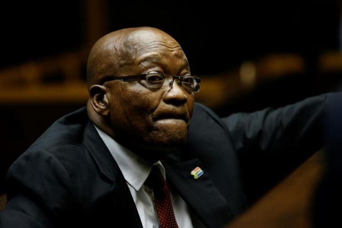 In the dock: Zuma pictured in court last November. He has been charged with 16 counts of graft linked to an arms deal from before he became president.