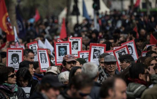 A march backed by leftist groups in Chile brought thousands to the streets of Santiago to honor victims of the Pinochet dictatorship and call for greater urgency in investigating its crimes