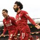 Liverpool's Mohamed Salah (right) and Roberto Firmino (left) celebrate a huge win for their title ambitions