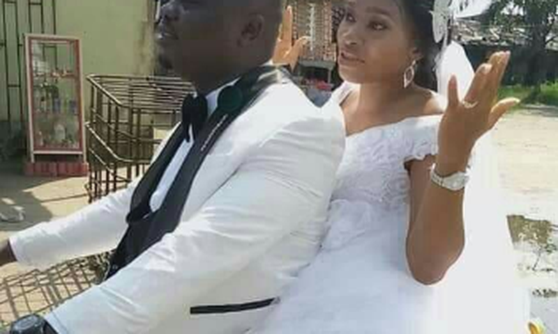 Newly weds spotted on a motorbike
