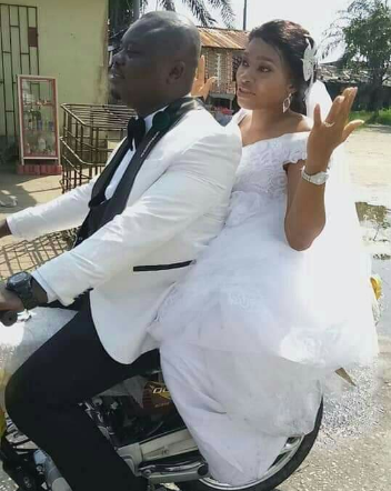 Newly weds spotted on a motorbike