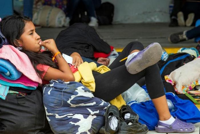 Venezuelan asylum-seekers, like these at a border post in Peru, are flowing out of their crisis-wracked country