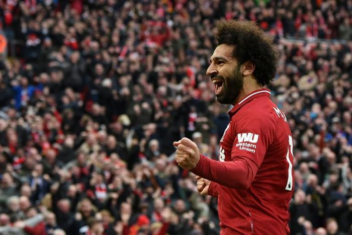 Mohamed Salah celebrates after a late own goal from Tottenham defender Toby Alderweireld