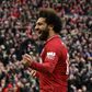 Mohamed Salah celebrates after a late own goal from Tottenham defender Toby Alderweireld