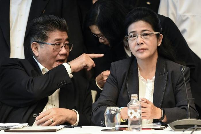 Pheu Thai party leaders Phumtham Wechayachai (L) and Sudarat Keyuraphan attend press conference in Bangkok