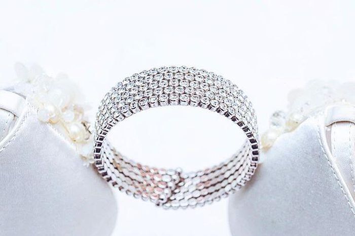 White bridal shoes and diamond ring