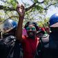 Zimbabwe civil servants marched in a rally against low wages in Harare, heavily guarded by anti-riot police