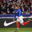 Mesmerising Kylian Mbappe was among the scorers as world champions France crushed Iceland in Euro 2020 qualifiers Monday, but Cristiano Ronaldo hobbled off in Portugal's disappointing draw with Serbia