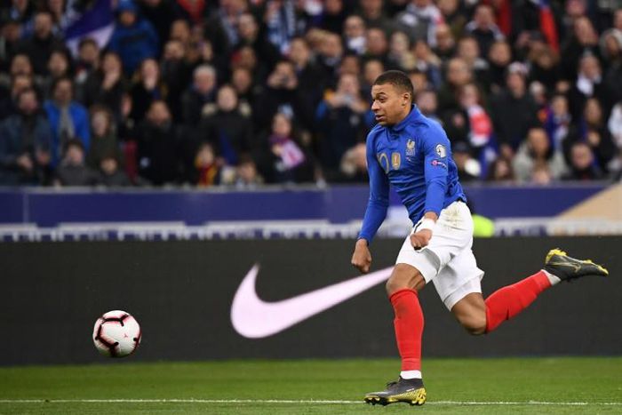 Mesmerising Kylian Mbappe was among the scorers as world champions France crushed Iceland in Euro 2020 qualifiers Monday, but Cristiano Ronaldo hobbled off in Portugal's disappointing draw with Serbia