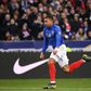Mesmerising Kylian Mbappe was among the scorers as world champions France crushed Iceland in Euro 2020 qualifiers Monday, but Cristiano Ronaldo hobbled off in Portugal's disappointing draw with Serbia