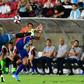 Leandro Paredes of Argentina (L) vies for the ball with Alexis Sanchez of Chile (R) as the teams played to a 0-0 draw in their friendly international football match at LA Memorial Coliseum