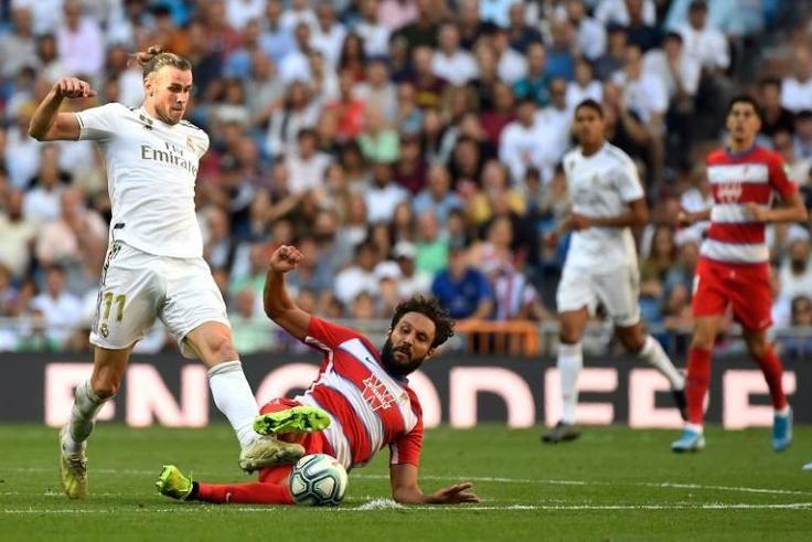 Real Madrid's Welsh forward Gareth Bale plays against Granada in La Liga on October 5