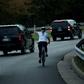 This photo from October 2017 shows Juli Briskman flipping off Donald Trump's presidential motorcade
