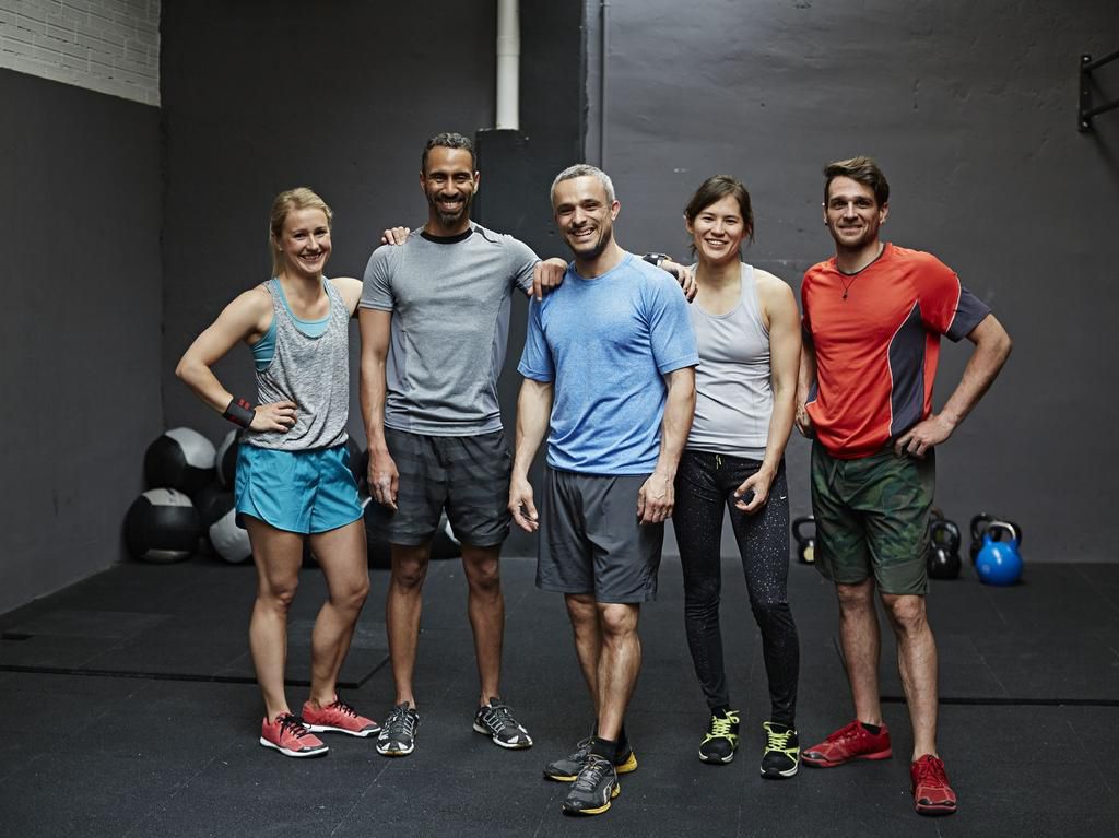 Portrait of smiling gymters