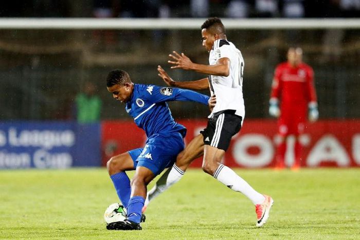 A file photo of SuperSport United midfielder Sipho Mbule (L), who scored the only goal in a South African Premiership match against Bidvest Wits in Johannesburg Friday