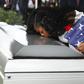Myeshia Johnson kisses the casket of her husband US Army Sgt. LaDavid Johnson, who was killed in the October 4, 2017 ambush in Niger