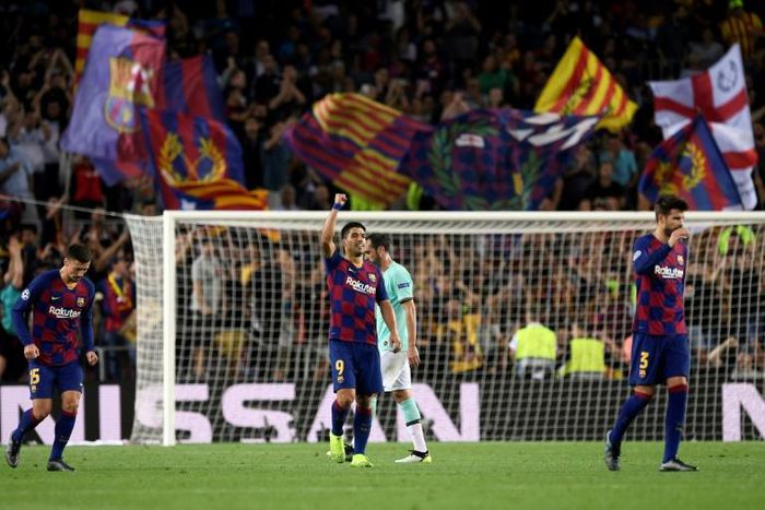 Barcelona forward Luis Suarez celebrates his second goal