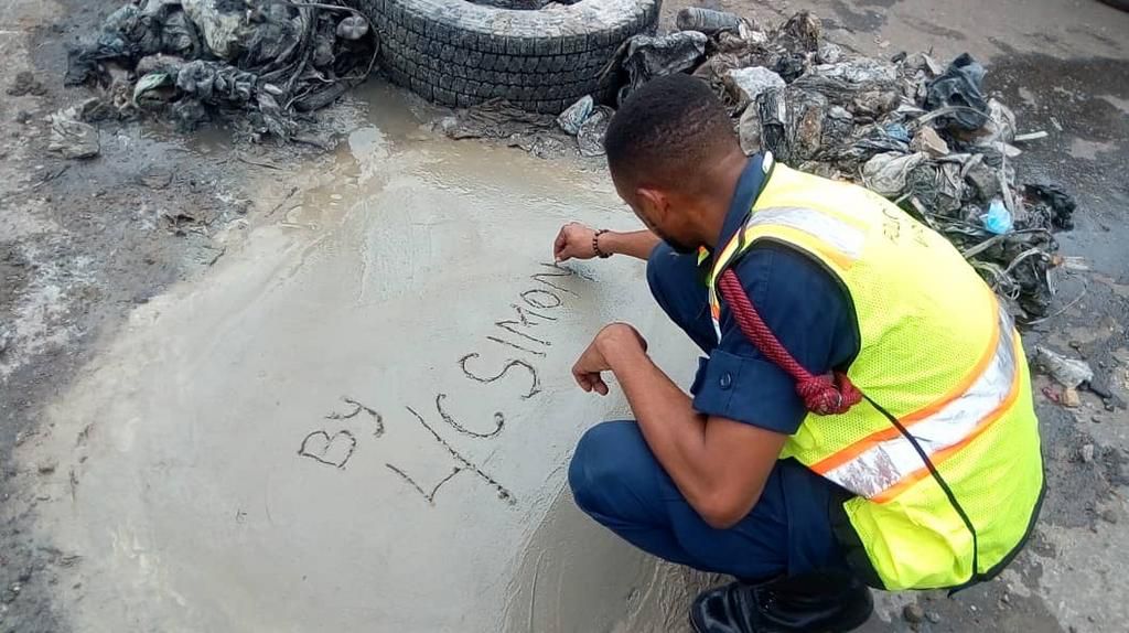 Lance Corporal Simon Agbeko desilts choked drains in Accra