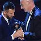 Argentina and Barcelona forward Lionel Messi (L) is presented with the men's player of year award by FIFA President Gianni Infantino.