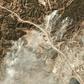 Smoke from the Saddleridge fire about 20 miles north of downtown Los Angeles is seen in this image from Planet Labs Inc