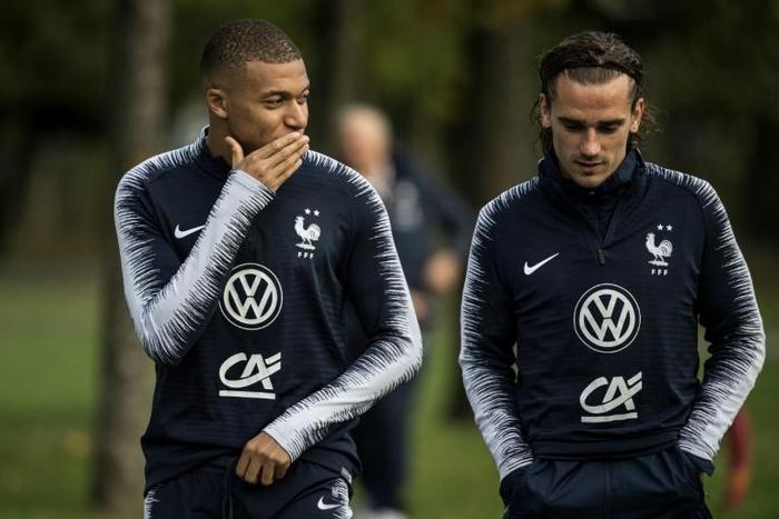 Kylian Mbappe (left) and Antoine Griezmann in training with France at Clairefontaine-en-Yvelines on Monday.