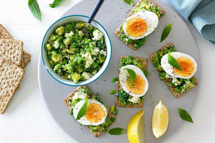 smashed pea avocado feta and egg crispbreads