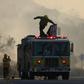 Firefighters work during the Tick Fire on October 24, 2019 in Canyon Country, California.
