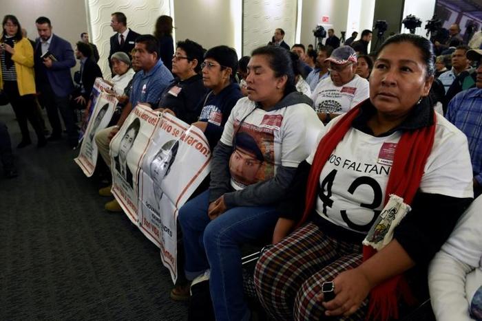 Relatives of some of the 43 missing students from the Ayotzinapa teachers' college in Mexico's southern state of Guerrero are pictured in early 2019