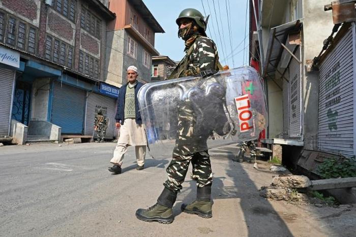 Indian troops kept a muscular presence but clashes broke out in various parts of Kashmir as an unofficial European Parliament delegation visited