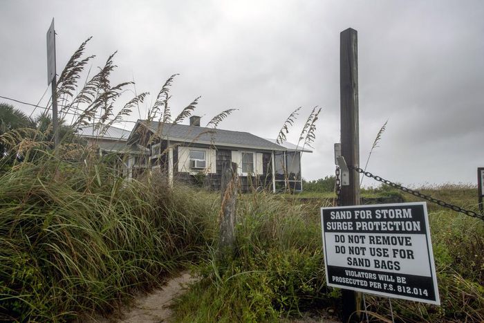 Churning North, Hurricane Drubs Weary Carolinas