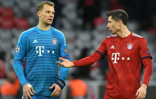 Bayern Munich's Germany goalkeeper Manuel Neuer and Polish forward Robert Lewandowski count the cost of their Champions League exit