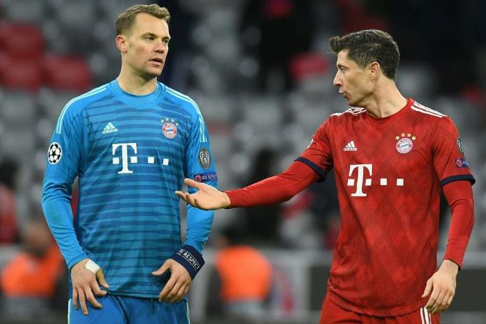 Bayern Munich's Germany goalkeeper Manuel Neuer and Polish forward Robert Lewandowski count the cost of their Champions League exit