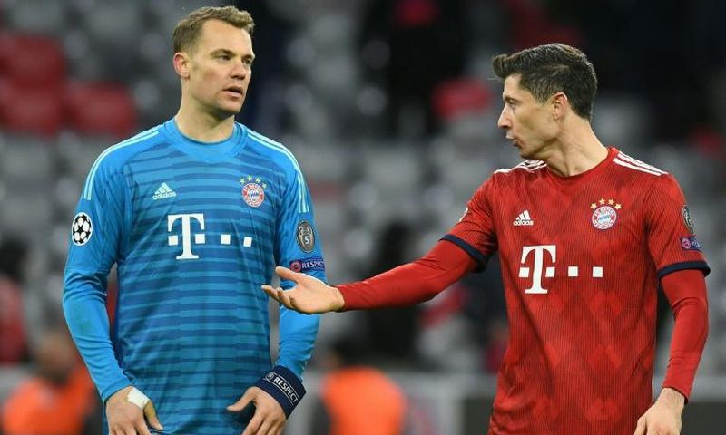 Bayern Munich's Germany goalkeeper Manuel Neuer and Polish forward Robert Lewandowski count the cost of their Champions League exit