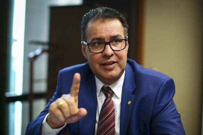 Brazilian lawmaker Jose Augusto Rosa, known as Captain Augusto, wants Brazilians to have easier access to guns to defend themselves in a "civil war" against criminals