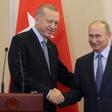 Turkey's Recep Tayyip Erdogan (L) hailed "a historic agreement" on dealing with the Kurds in Syria following talks with Russia's Vladimir Putin at the Russian Black Sea resort of Sochi