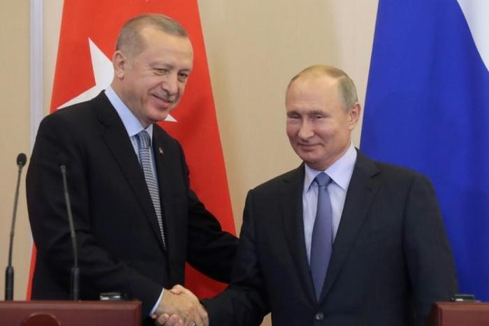 Turkey's Recep Tayyip Erdogan (L) hailed "a historic agreement" on dealing with the Kurds in Syria following talks with Russia's Vladimir Putin at the Russian Black Sea resort of Sochi