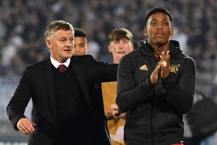 Ole Gunnar Solskjaer (left) is hoping the return of Anthony Martial (right) will spark Manchester United's attack into life