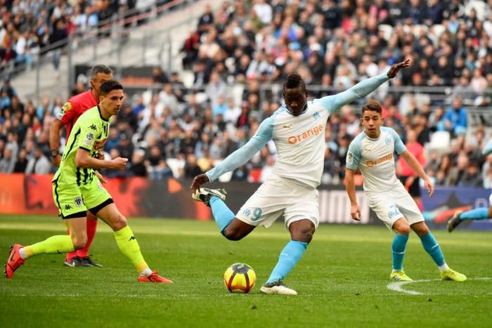 On target: Mario Balotelli scores for Marseille