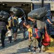 The first 635 migrants left out early Monday