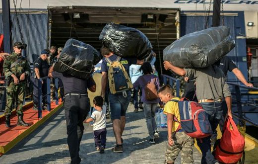 The first 635 migrants left out early Monday