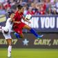 American Carli Lloyd competes for the ball with Portugal's Ana Borges in the first half of the United States' 4-0 friendly win at Lincoln Financial Field