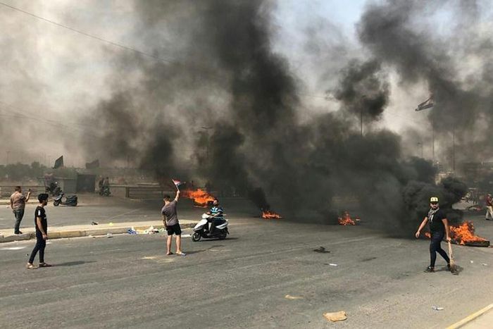 Protests erupt in Baghdad for a second straight day prompting security forces to fire live rounds in the air despite calls for restraint from President Barham Saleh