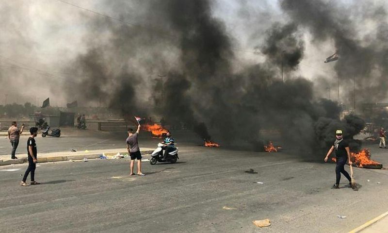 Protests erupt in Baghdad for a second straight day prompting security forces to fire live rounds in the air despite calls for restraint from President Barham Saleh
